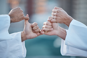 Image showing Hands, karate and grip with sports people fighting outdoor in a competition, battle or combat. Fitness, self defense and thumb war with athletes wrestling while training for martial arts together