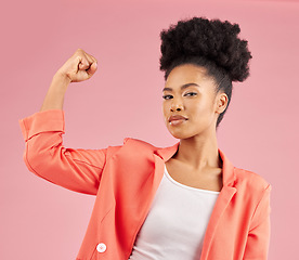 Image showing Portrait, black woman and flex for power, winning and empowerment against a studio background. Face, female person and model with strength, arm muscle and achievement with success, strong and energy