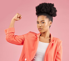 Image showing Portrait, black woman and flex for power, strong and leadership against a studio background. Face, female person and model with strength, arm muscle and achievement with success, winning and energy