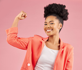 Image showing Portrait, black woman and flex for power, energy and happiness against a studio background. Face, female person and model with strength, arm muscle and achievement with success, challenge and winning