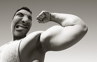 Image showing Mean man with big muscles