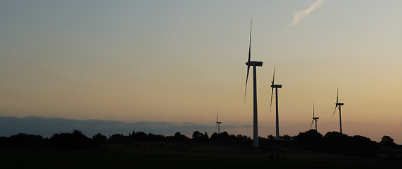 Image showing windturbines on sunset