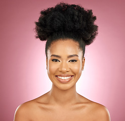 Image showing Smile, beauty and portrait of a black woman for skincare, wellness and dermatology. Happy, cosmetics and a headshot of a young girl or model with facial makeup isolated on a pink background in studio