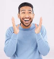 Image showing Wow, smile and happy asian man in studio for celebration, news or sale promo on grey background. Face, winner and Japanese guy customer excited for competition, lotto or cashback bonus prize reward