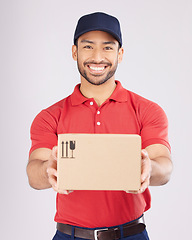 Image showing Happy, shipping box or portrait of delivery man in studio with courier service, supply chain package or smile. Asian, white background or worker with distribution, online shopping and mail services