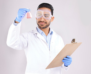 Image showing Scientist man, beaker and thinking with checklist, analysis and ppe goggles in studio by white background. Asian science expert, clipboard and paperwork for chemistry, ideas and study at pharma job