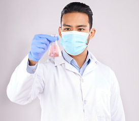 Image showing Medical, chemical and man with research, healthcare or sample analysis against a white studio background. Vaccine, male person or scientist with drugs, pharma or chemistry with liquid or development