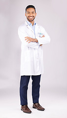 Image showing Portrait, man and happy scientist with arms crossed in studio isolated on a white background. Confidence, smile and Asian doctor, science expert or medical professional from Singapore on mockup space