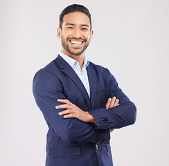 Image showing Portrait, business and asian man in studio with arms crossed for professional style of broker, financial advisor or suit on white background. Happy investment planner, corporate fashion or confidence