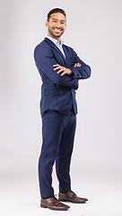 Image showing Portrait, business and asian man in studio with arms crossed for professional style of financial advisor trading in suit on white background. Happy entrepreneur, confident trader or corporate fashion