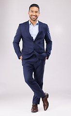 Image showing Portrait, business and asian man in studio with suit for financial trading, professional style and entrepreneur on white background. Happy young male trader, corporate fashion and confidence of pride