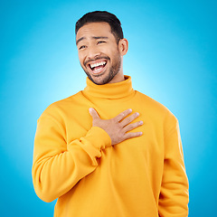 Image showing Young man, ego and pride in studio, with choice of me and comic laugh with trendy clothes by blue background. Funny gen z person, fashion model or happy student with smile after joke with self love