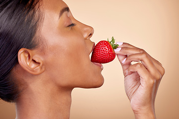 Image showing Eating, strawberry and profile of woman for skincare with natural beauty or benefits from healthy nutrition, diet and fruit. Girl, bite of food and vitamin c for skin to glow, shine or wellness