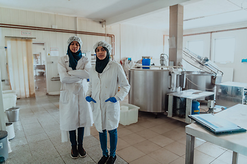 Image showing Arab business partner visiting a cheese factory. The concept of investing in small businesses