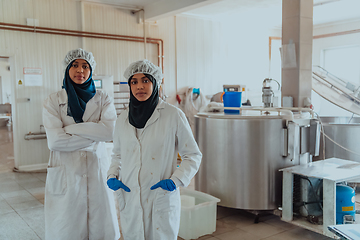 Image showing Arab business partner visiting a cheese factory. The concept of investing in small businesses