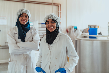 Image showing Arab business partner visiting a cheese factory. The concept of investing in small businesses