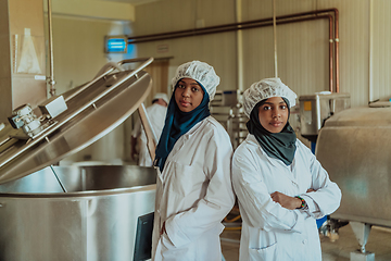 Image showing Arab business partner visiting a cheese factory. The concept of investing in small businesses