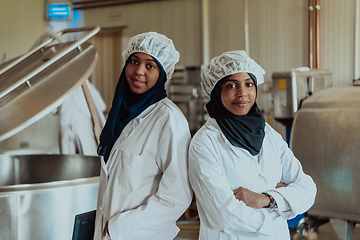 Image showing Arab business partner visiting a cheese factory. The concept of investing in small businesses