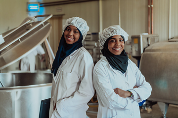 Image showing Arab business partner visiting a cheese factory. The concept of investing in small businesses