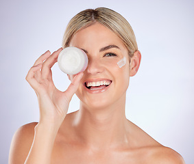 Image showing Skincare portrait, happiness and woman with cream container for facial hydration, anti aging or collagen shine. Face lotion, studio or female model with melasma prevention product on white background