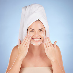 Image showing Shower, woman and portrait of face wash soap in studio, blue background and cleaning cosmetics. Happy female model, facial skincare and foam for healthy aesthetic, dermatology or moisturizing beauty