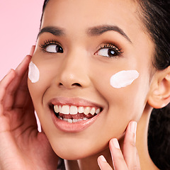 Image showing Cream, beauty and face of a happy woman with skin care, dermatology and natural glow. Headshot of a young female aesthetic model with a smile for moisturizer, cosmetics or sunscreen in studio
