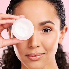 Image showing Face, skincare and woman with cream jar in studio isolated on a pink background. Portrait, beauty and natural model with moisturizer container, sunscreen cosmetic and dermatology product for wellness