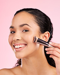 Image showing Happy, makeup and brush with portrait of woman in studio for foundation, cosmetics and facial. Skincare, health and self care with female model on pink background for dermatology, beauty and product