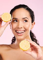 Image showing Skincare, lemon and woman thinking of beauty, cosmetics and natural product or vitamin c benefits. Happy african person or model with fruits ideas for skin care dermatology on pink, studio background