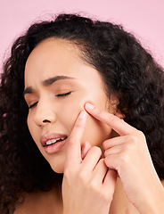 Image showing Skincare, woman and acne or squeeze pimple with beauty in pink or studio background for self care. Natural, face and girl with blackhead or dermatology problem with cosmetic or facial treatment.