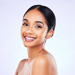 Image showing Portrait, beauty and smile with a model woman in studio on a gray background for natural wellness. Face, skincare and aesthetic with a happy young person posing for luxury cosmetics or dermatology