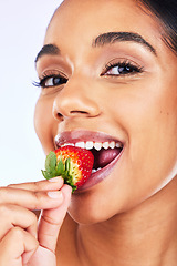 Image showing Portrait, strawberry and Indian woman in studio for health, diet and detox, nutrition and wellness. Fruit, berry and face of lady with natural, vegan or organic snack for weight loss and antioxidants