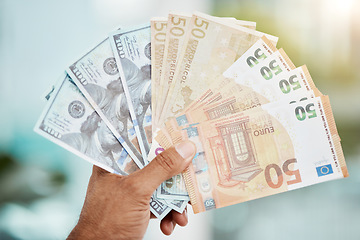 Image showing Cash in hand and dollars or euros from winning lottery, prize or bonus with interest, profit or investment of savings in bank. Finance, winner and money notes or lotto, award from cashback and credit