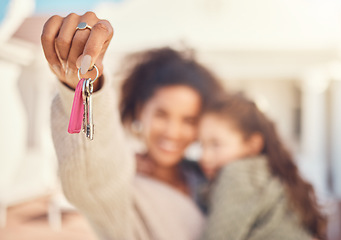 Image showing Hand, real estate and a person with keys to a house for a property for a child and single mother. Realtor showing, family and a woman moving into a new home or apartment with a girl kid together