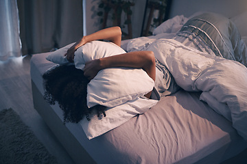 Image showing Bedroom, insomnia and woman with pillow on face, tired and frustrated with stress, nightmare or dream. Fatigue, sleep problem and exhausted girl in bed with fear, scared at night and crisis in home.