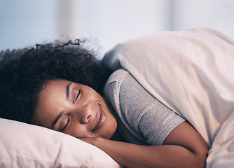 Image showing Sleeping, woman and smile in bed with morning nap at home with rest feeling calm with peace. House, bedroom and tired female person relax and comfortable on a pillow with blanket dreaming on weekend