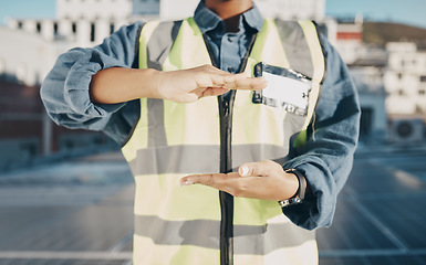 Image showing Hands, construction and engineer on a roof for solar energy, building electric plant or electricity advertising. Sustainable marketing, gesture and a worker for electrician innovation and maintenance