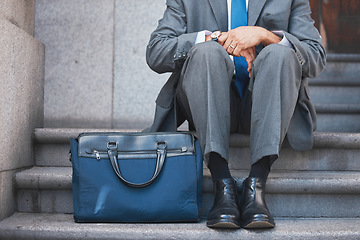 Image showing Lawyer, briefcase and man shoes on city and urban steps of government building outdoor. Businessman, justice and luggage for professional work of employee on a break of legal career of a attorney