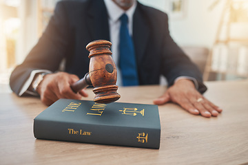 Image showing Book, judge and gavel with hands of man in office for lawyer, justice and legal hearing. Attorney, advocate and crime with closeup of person law firm for courtroom, knowledge and jury guide