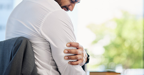 Image showing Businessman, pain in arm or injury to muscle from accident, stress or strain in the office, workplace or medical emergency at work. Man, sore arms or strain on muscles from working or activity