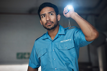 Image showing Police, search and man with flashlight for investigation, inspection and property patrol at night. Surveillance, law and security male person in dark room for safety, crime and protection service