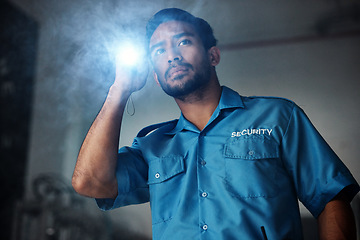 Image showing Torch, security and man at night for investigation, inspection or property search in dark room. Surveillance, law and police male person with flashlight for safety, crime guard and protection service