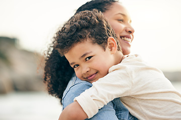 Image showing Hug, portrait and a mother and child at the beach for summer, holiday or happiness together. Smile, care and mom with a kid at the ocean for a vacation, bonding or travel in Costa Rica for love