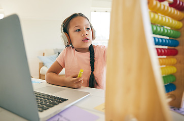 Image showing Child, online learning and abacus with laptop and children education app with studying. Computer, young girl and headphones with tech and digital course with kids and elearning at home on desk