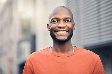 Image showing .Black man, smile and portrait outdoor on a city street with a positive mindset, confidence and freedom. Face of a happy african person or student on an urban road with casual style for travel.