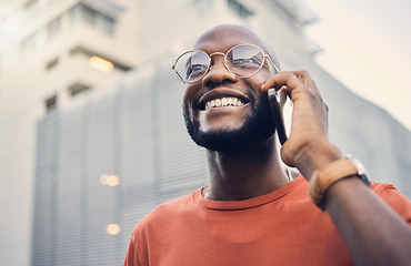 Image showing .Black man, smile and phone call outdoor on a city street with a positive mindset and confidence. Face of a happy african person with glasses on an urban road with a smartphone for communication.