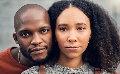 Image showing .Face, couple and love outdoor, serious and bonding together for support in urban city. Portrait, interracial and African man and woman with profile picture for care, commitment and trust on date.