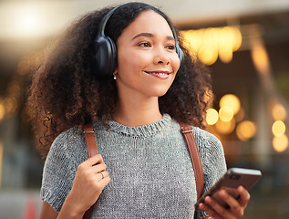 Image showing .City, headphones and woman with cellphone, smile and connection with happiness, mobile app and streaming music. Outdoor, female person and happy girl with a smartphone, sound and headset with audio.