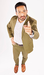 Image showing Portrait, pointing and scolding with a business man in studio on a white background for discipline. Manager, finger wag and accuse with a serious young boss telling off an employee for control