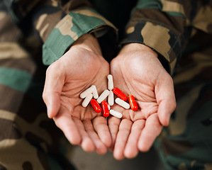 Image showing Soldier, hands and drugs from psychologist in therapy or person healing mental health with medication, medicine or pills. Stress, anxiety and veteran in therapy with trauma, problem or depression